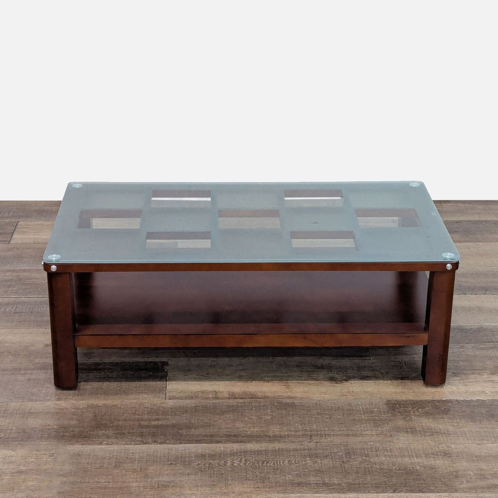 1. Reperch coffee table with patterned tempered glass top and wooden base, seen from the front on wood flooring.  