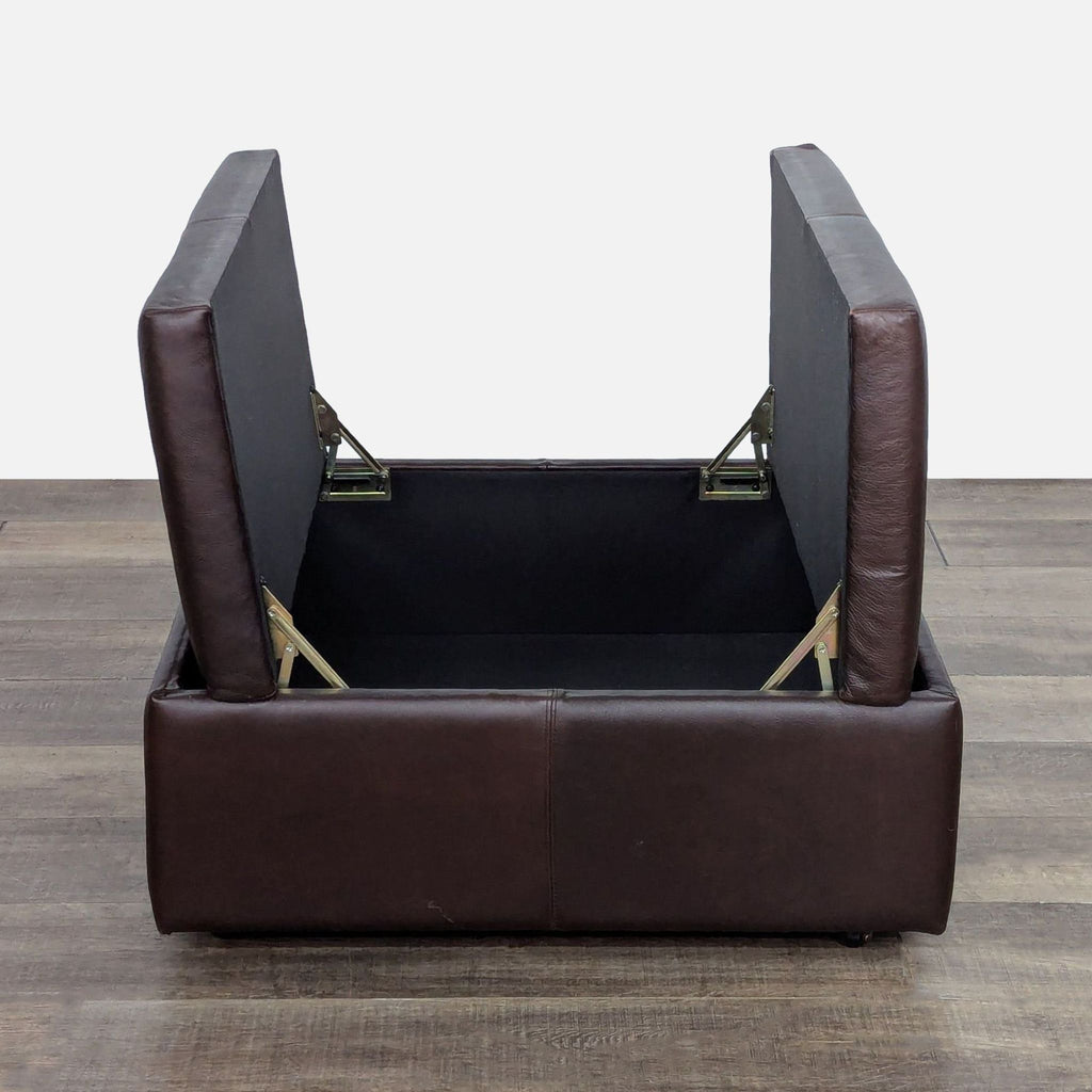 2. Storage ottoman by McCreary Modern with split top lids open, revealing spacious interior for organization.