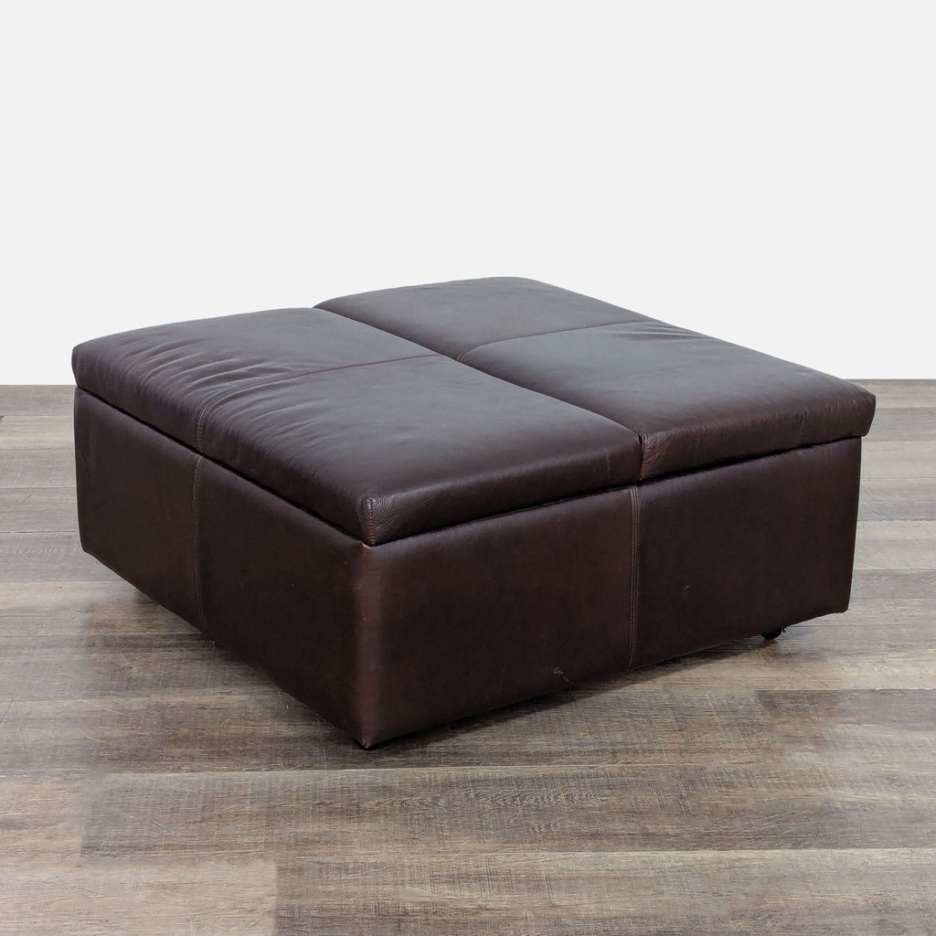 3. Angled view of McCreary Modern’s brown leather ottoman, highlighting its plush cushioned top and modern look.