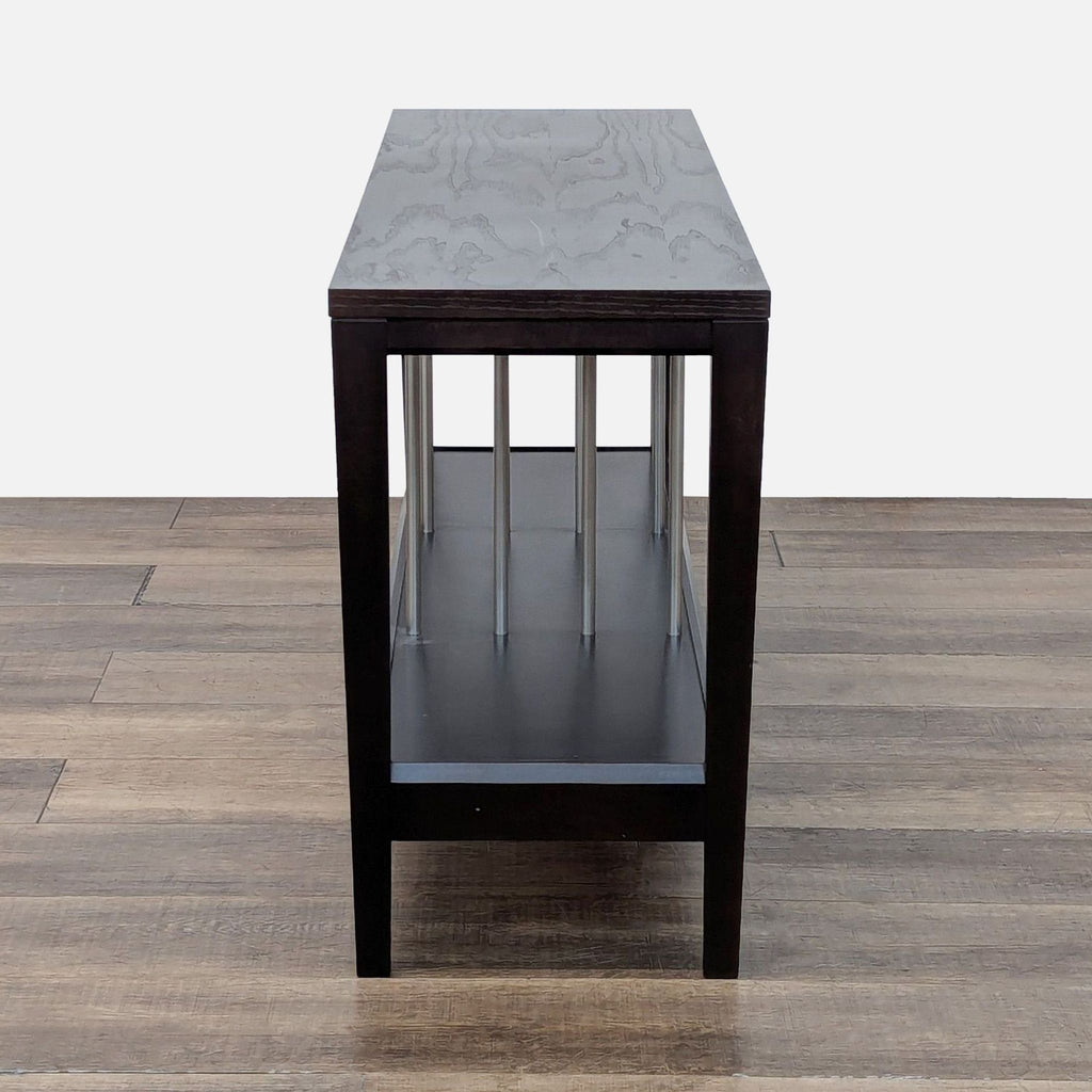 3. Modern Baronet Furniture console table, end view showing dark frame and array of metal rods.