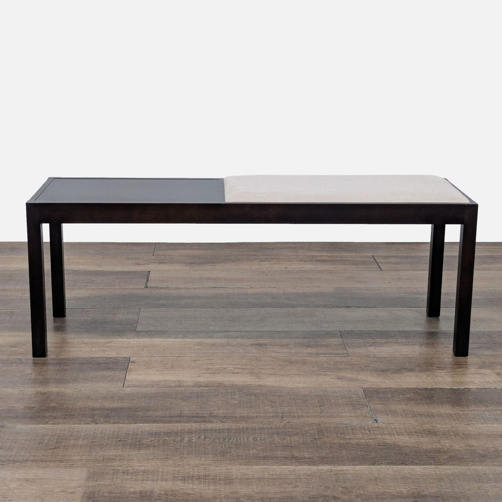 1. Modern wood bench with faux leather cushion by Crate & Barrel, suitable for use as a stool or ottoman.