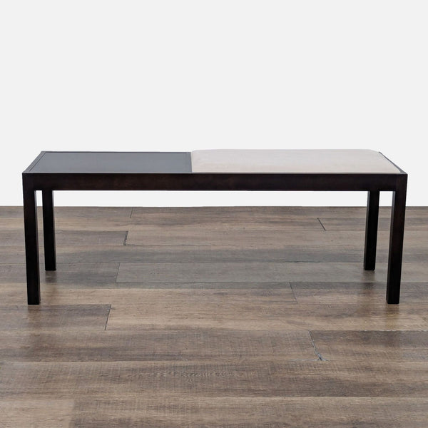 1. Modern wood bench with faux leather cushion by Crate & Barrel, suitable for use as a stool or ottoman.