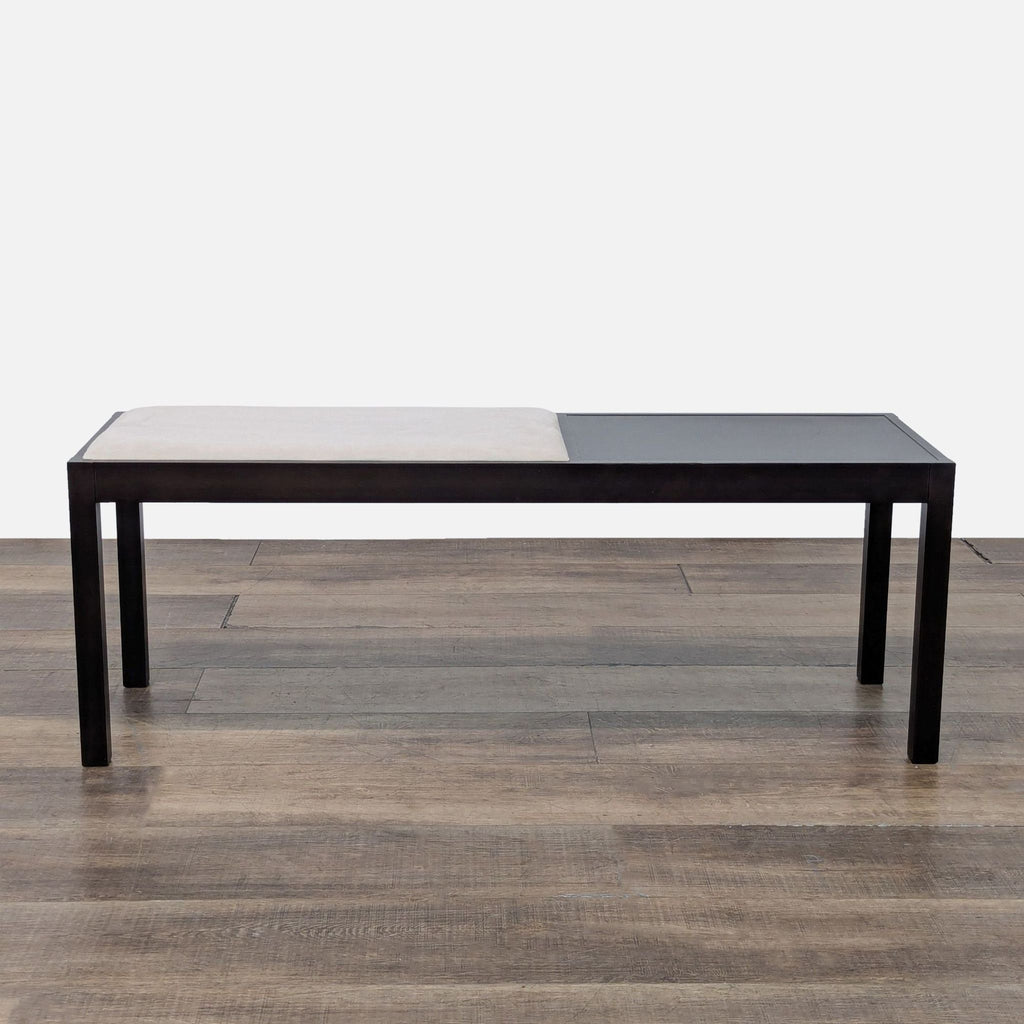 3. Crate & Barrel bench from Stools, Ottomans & Benches, dark wood frame and light faux leather cushion.