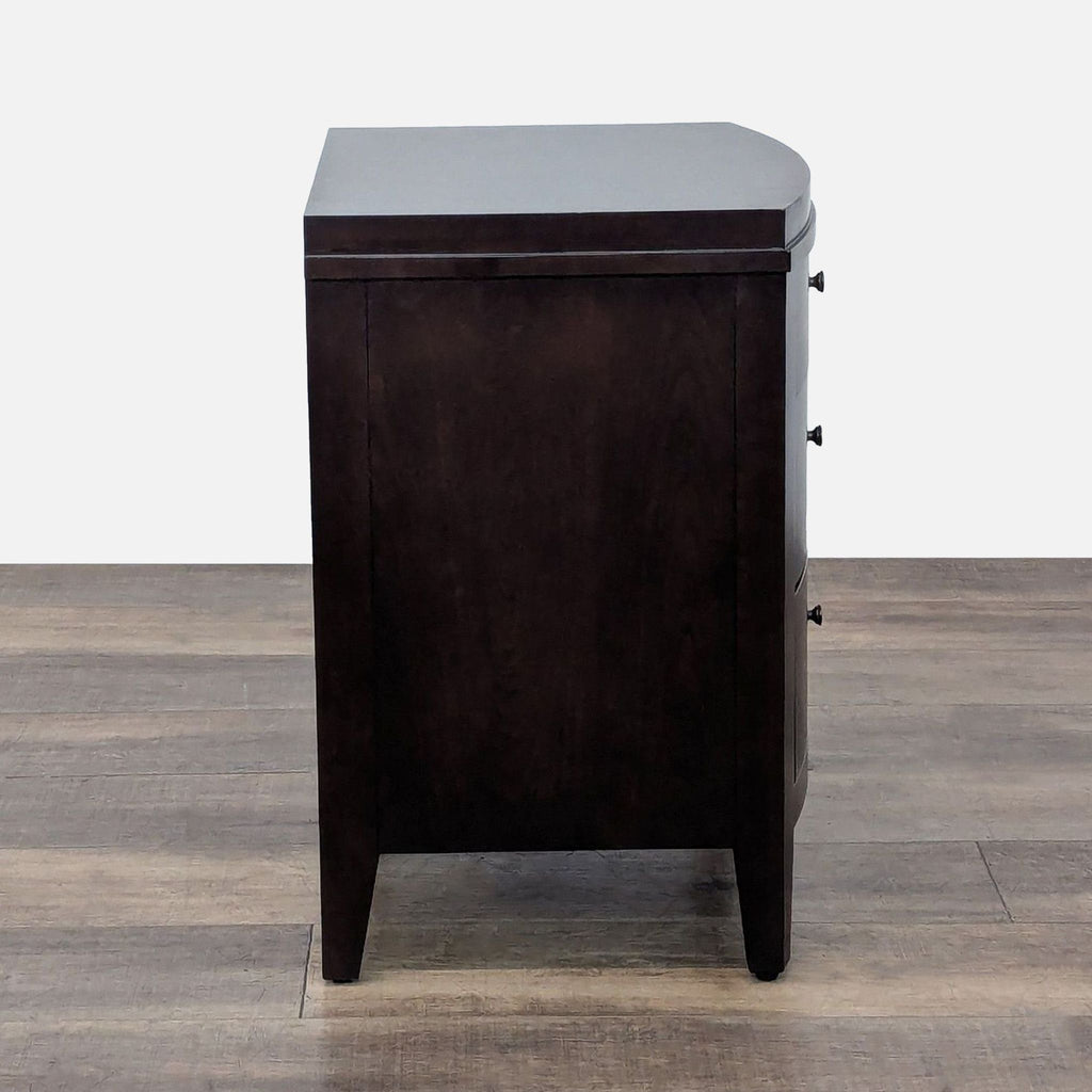 3. Side profile of Crate & Barrel end table in dark wood, highlighting its clean lines and solid build.