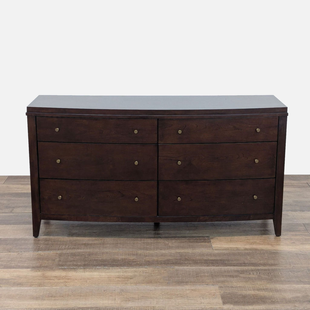 1. Crate & Barrel dresser with six drawers, gold tone pulls, and a sleek dark wood finish.  
