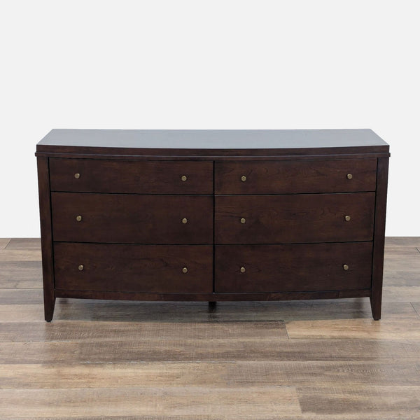 1. Crate & Barrel dresser with six drawers, gold tone pulls, and a sleek dark wood finish.  