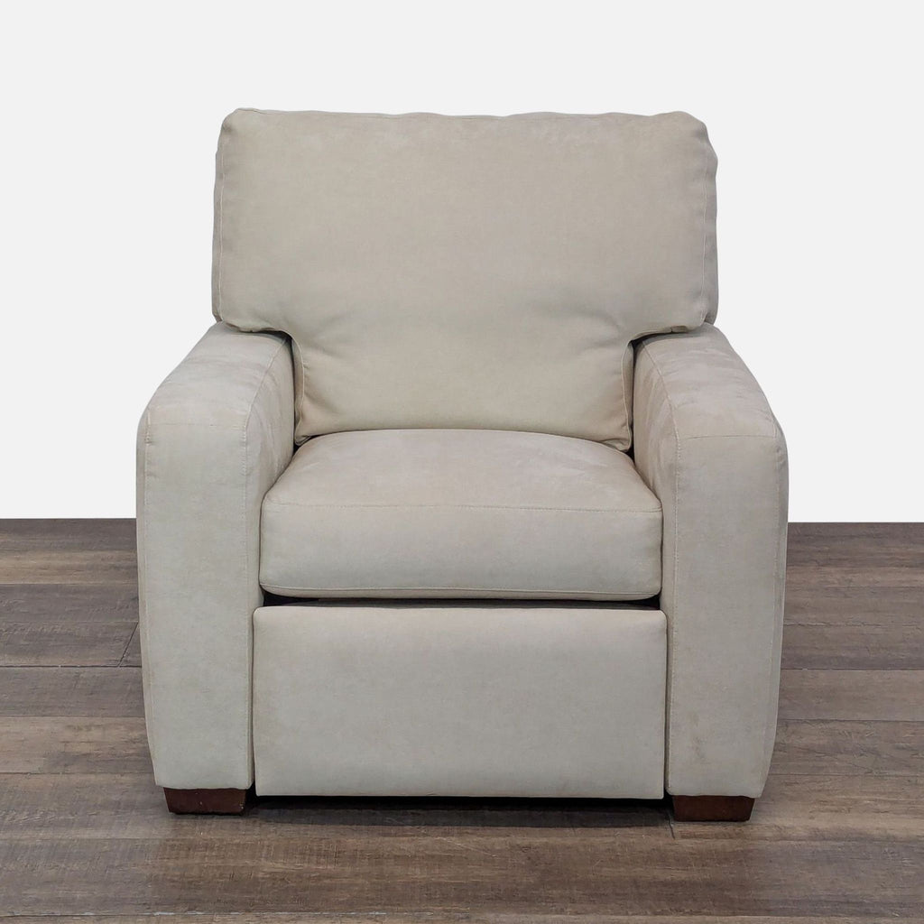 1. Front view of a neutral-toned American Upholstery lounge chair with plush cushions and wood feet.  