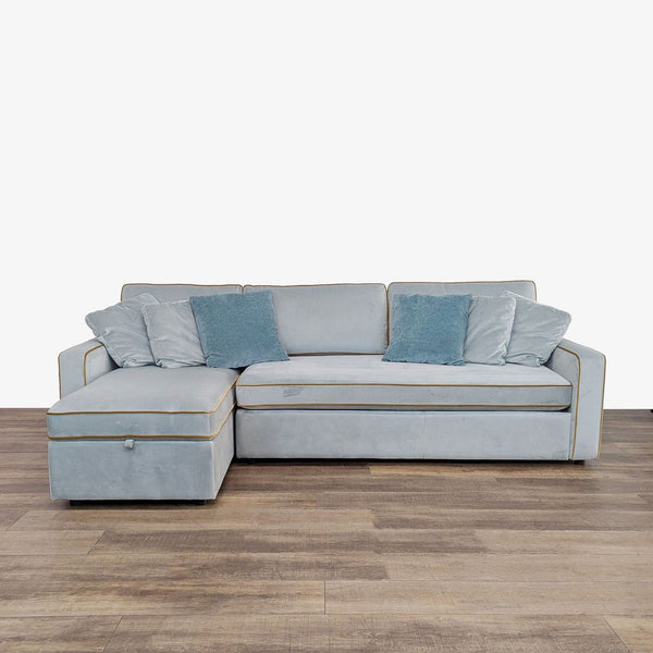 1. Light blue Interior Define sleeper sofa with chaise and blue cushions, suited for both seating and lounging.