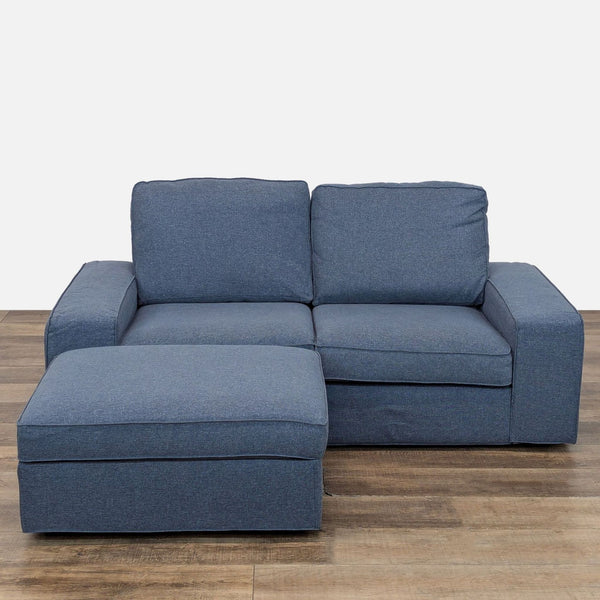 1. Front view of a blue Ikea Kivik sectional loveseat with removable Gunnared fabric and matching ottoman.  