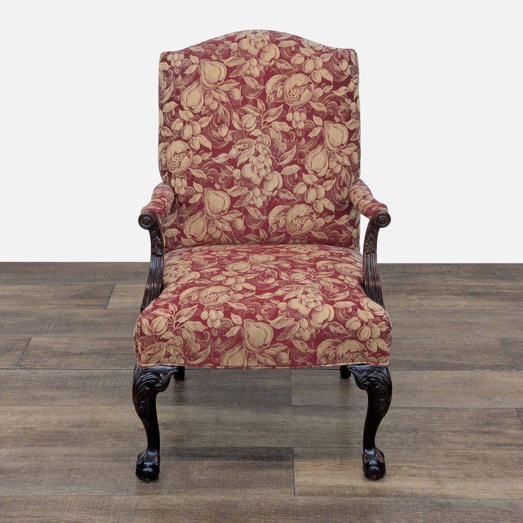 3. Floral upholstered Drexel chair with carved wooden arms and legs, displayed facing forward on wooden flooring.