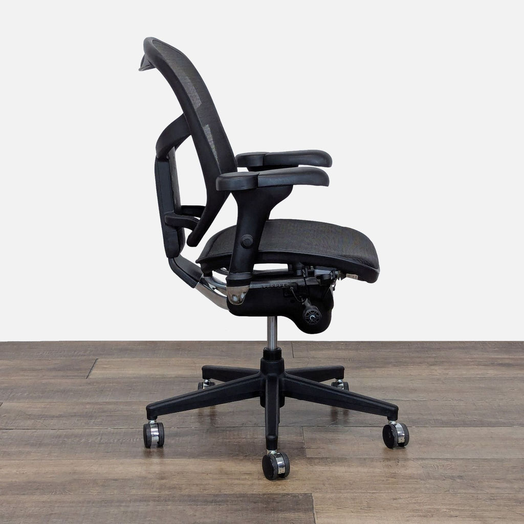 2. Side profile of a Realspace ergonomic chair featuring mesh fabric, adjustable tilt tension, and pneumatic height control.  