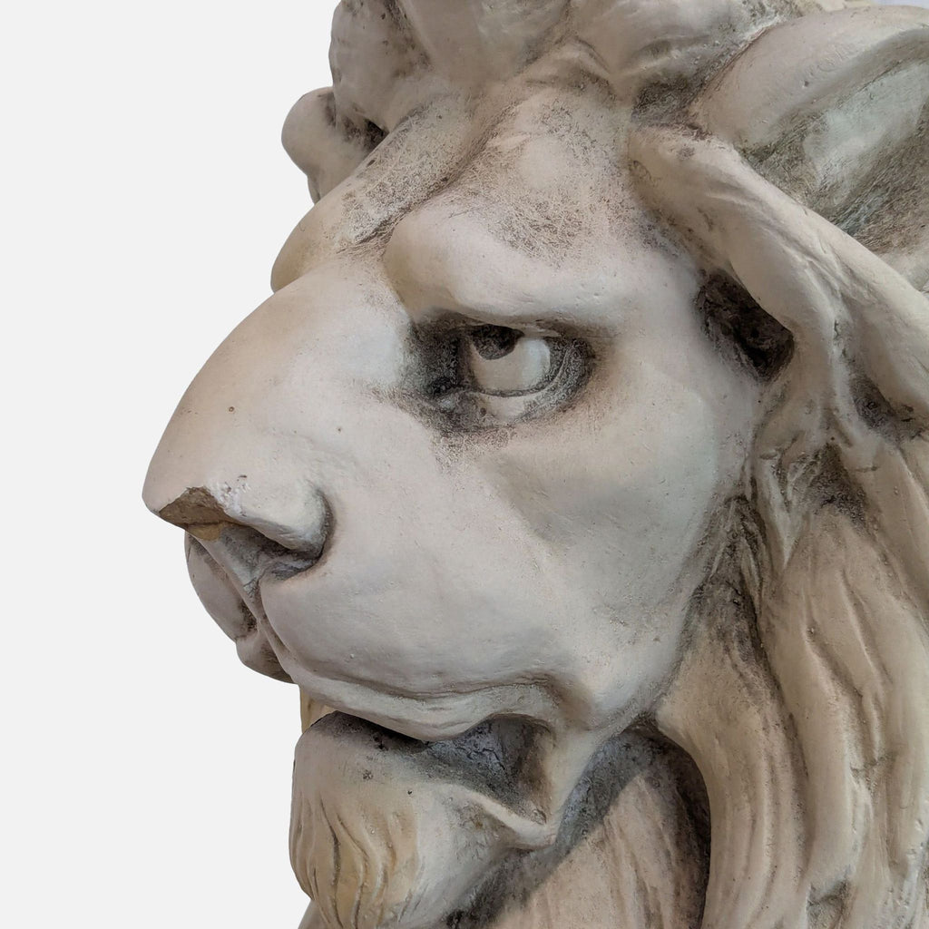 Close-up of the Reperch lion sculpture’s face, emphasizing detailed stone-finished concrete features.