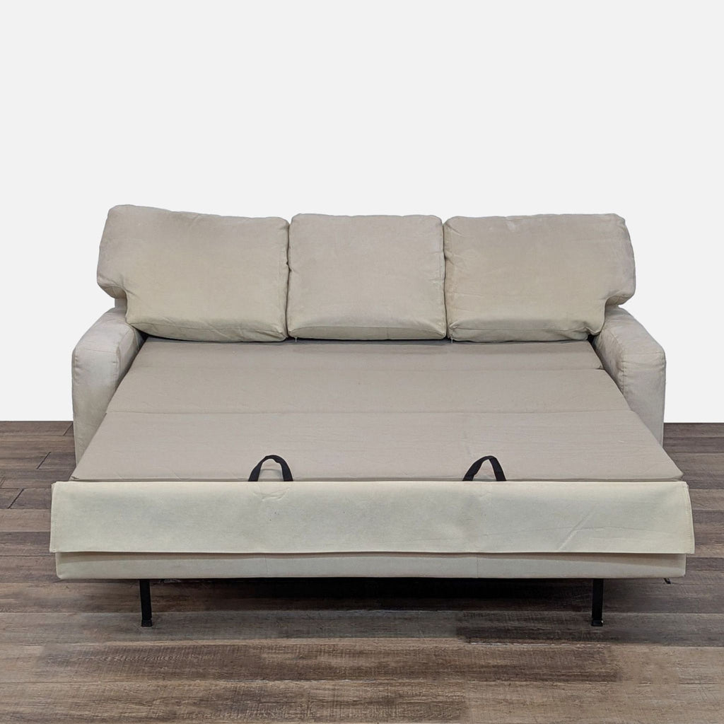 2. Pullout queen sleeper bed extended from the American Upholstery sectional sofa, showing the sleeping surface.