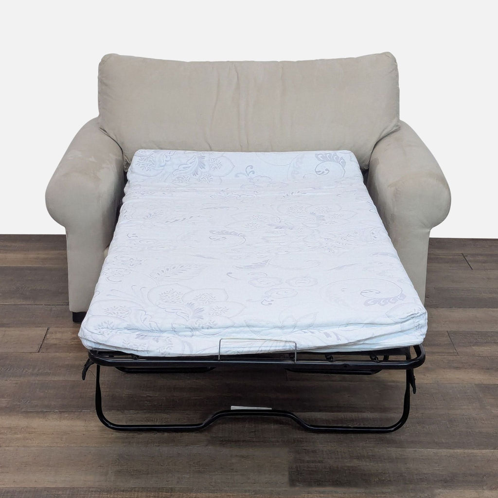 2. Pottery Barn sleeper sofa in stone suede fabric, shown extended as a twin memory foam pull-out bed.  