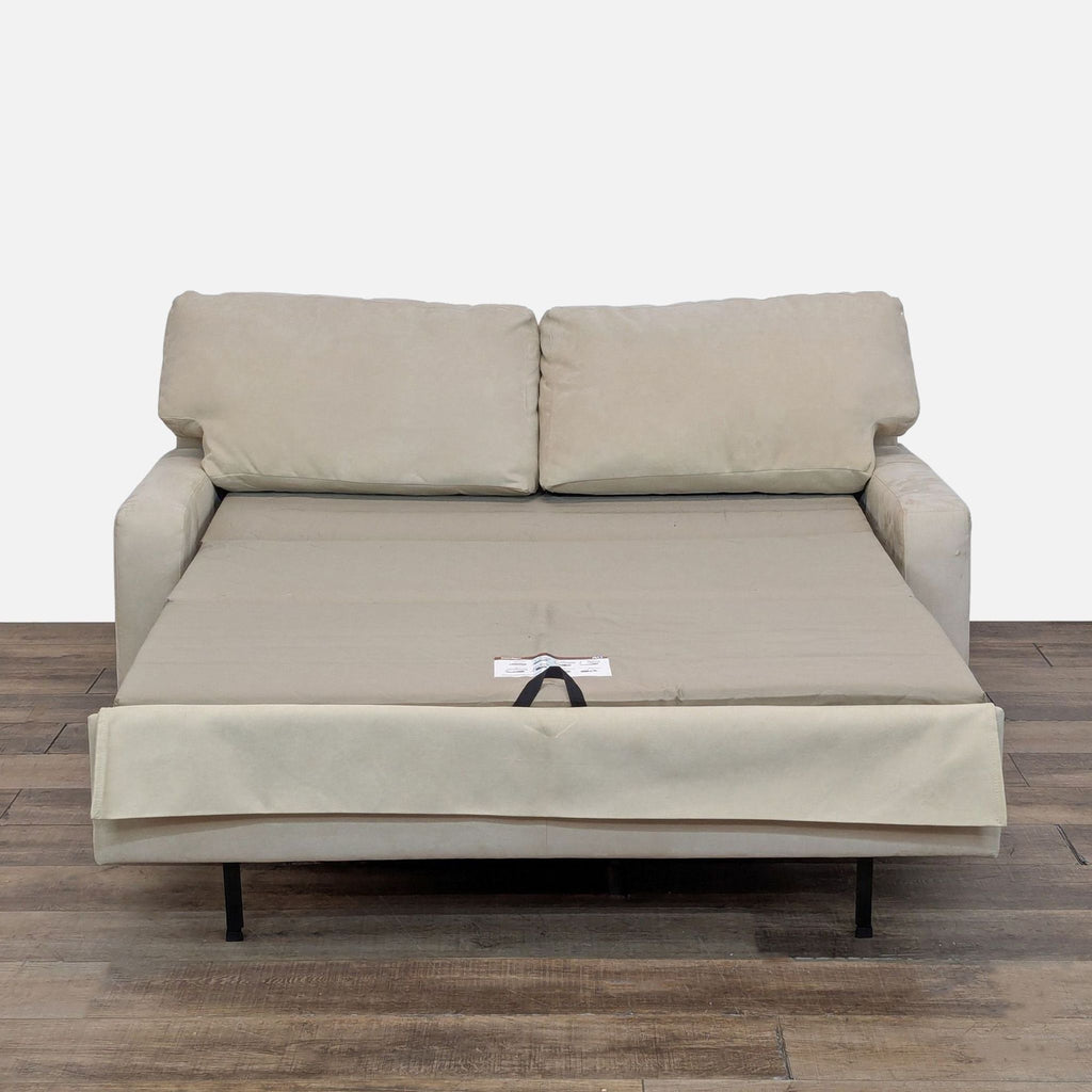 2. American Upholstery loveseat sleeper sofa pulled out to reveal a full-size sleeping surface.