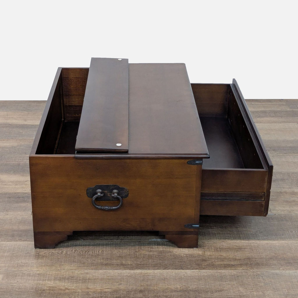 2. Side view of Reperch coffee table, highlighting lift-up panel and spacious internal storage compartment.