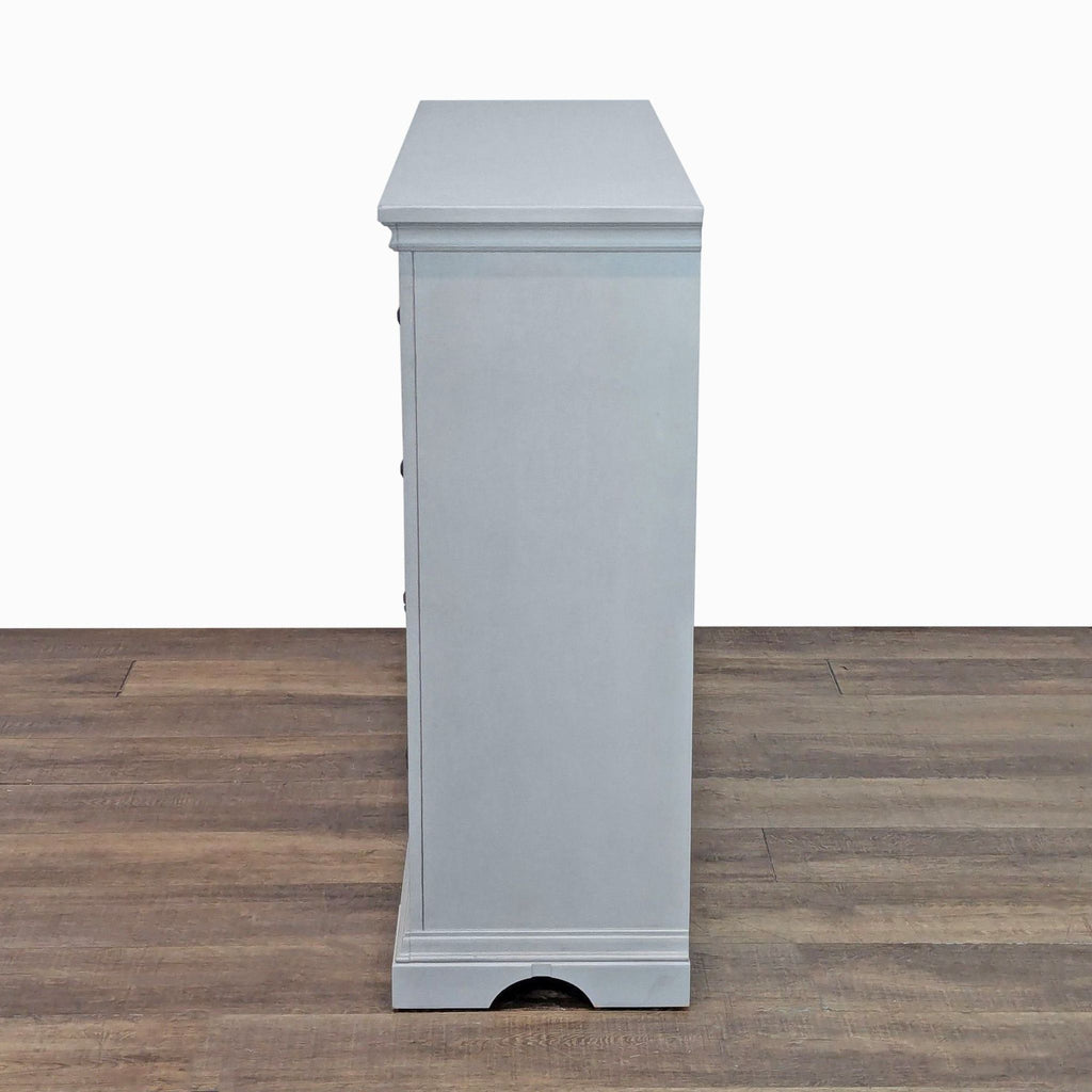 3. Side profile of the Universal Broadmoore dresser, highlighting its sturdy frame and classic design.