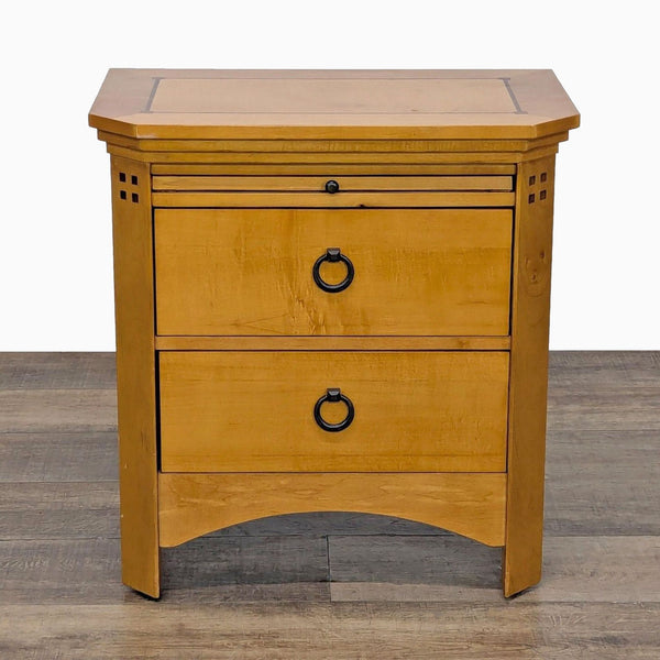 1. Front view of a Reperch end table with three drawers, featuring metal ring pulls and a natural wood finish.