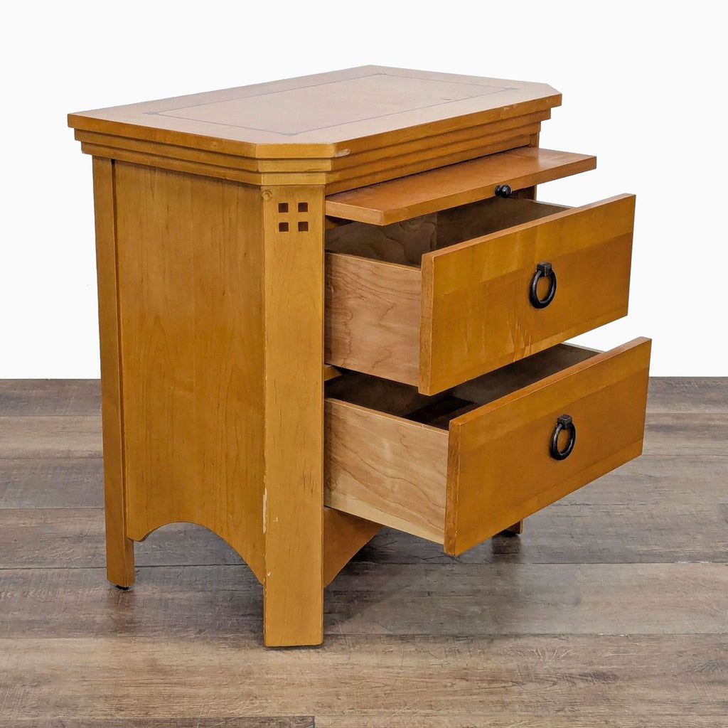 2. Angled view of Reperch end table showing partially open drawers and side wood detailing.