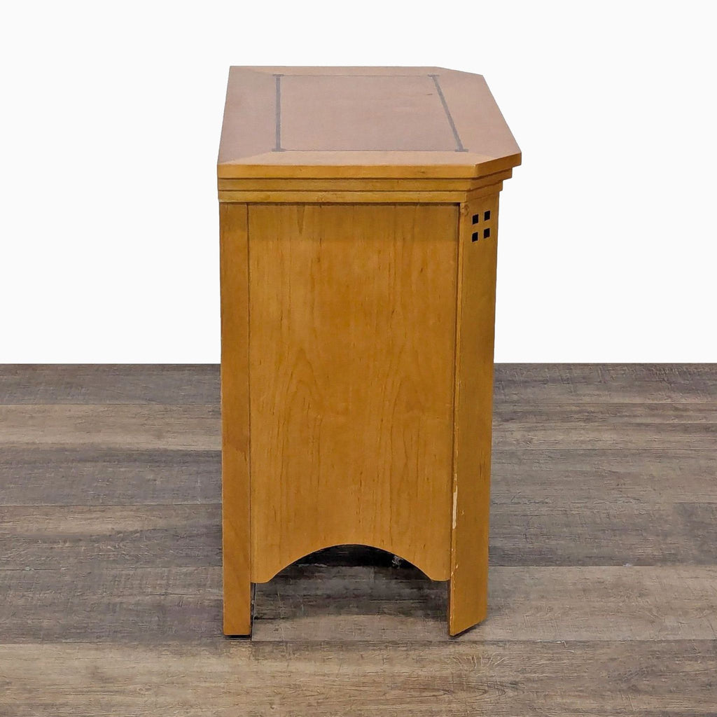 3. Side profile of a Reperch end table, highlighting its smooth wooden surface and arched base design.