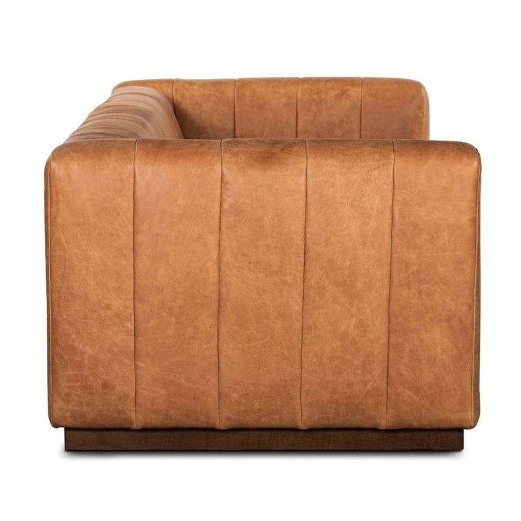 Side profile of the Poly & Bark 3-seat sofa showcasing its genuine distressed leather and boxy arms.  