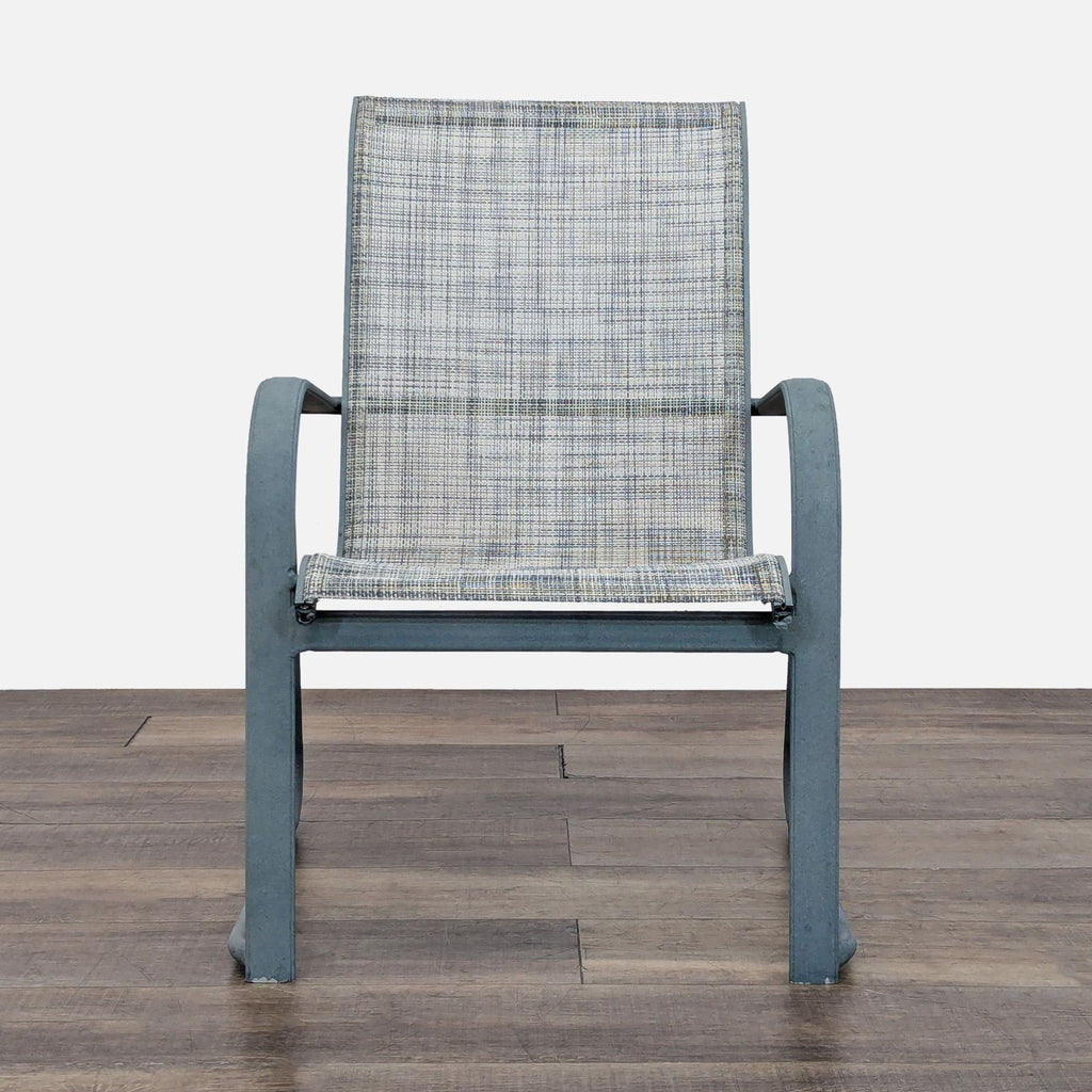 Front view of a Reperch chair with a sturdy metal frame and a woven mesh seat and back.  