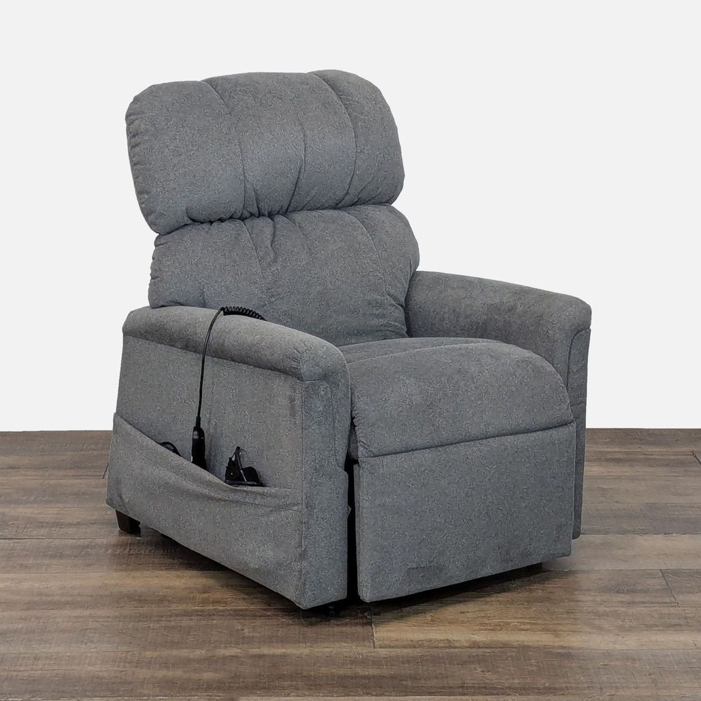 3. Angled view of a Golden Technologies lounge chair, highlighting its padded support and convenient remote storage pocket.