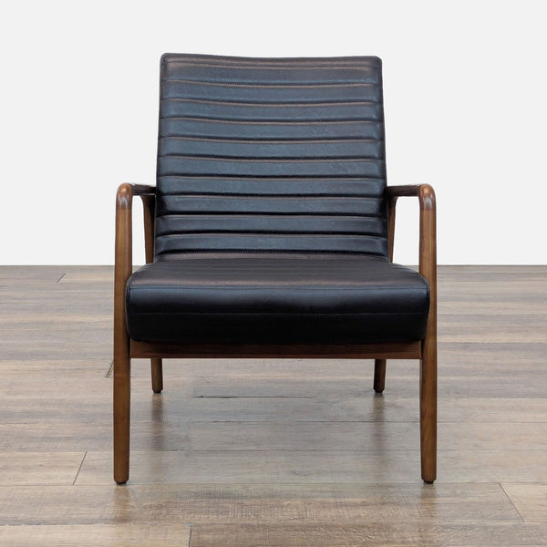Front view of Reperch lounge chair with a solid wood frame and black leather channel-tufted upholstery.  