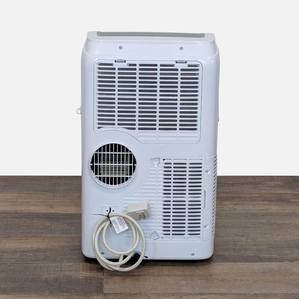 Rear view of a Black & Decker portable air conditioner, highlighting the exhaust vent, air filter, and cord storage.