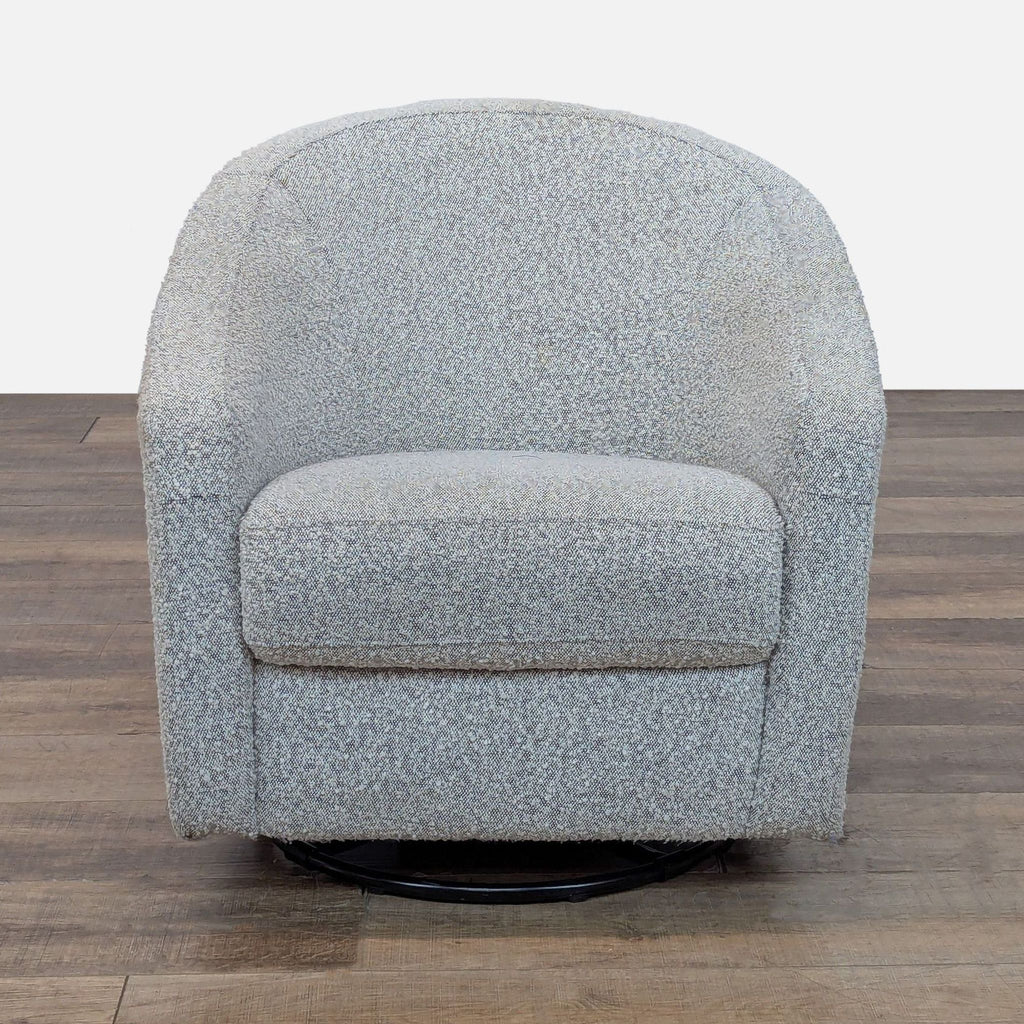Front view of Reperch Lounge chair featuring thick seat cushion, battle back, and black and white bouclé upholstery.  