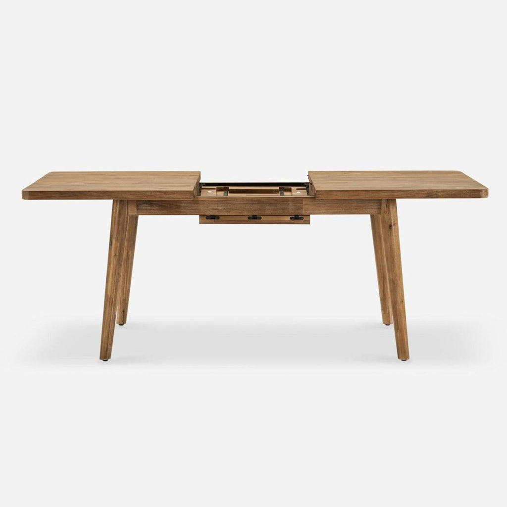 2. Dining table with split top and visible butterfly leaf mechanism, wire-brushed acacia wood in honey tone.  