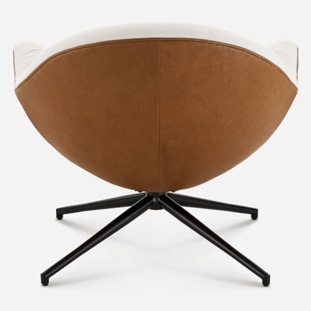 3. Rear angle of the Arden Swivel Armchair by Castlery, showing brown curved back and black base.