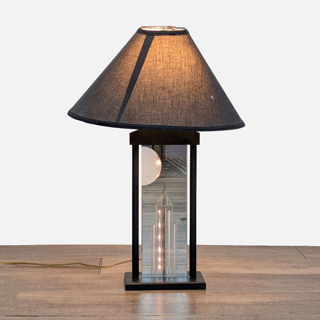 1. Reperch lamp with metal base, etched building on glass panel, and rope light accent illuminating the design.