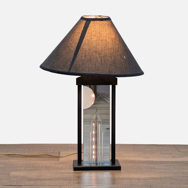 1. Reperch lamp with metal base, etched building on glass panel, and rope light accent illuminating the design.