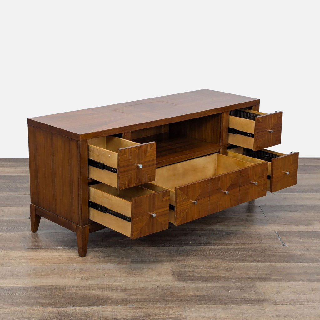 2. Side angle of the Reperch entertainment center displaying five drawers partially opened and central shelf.