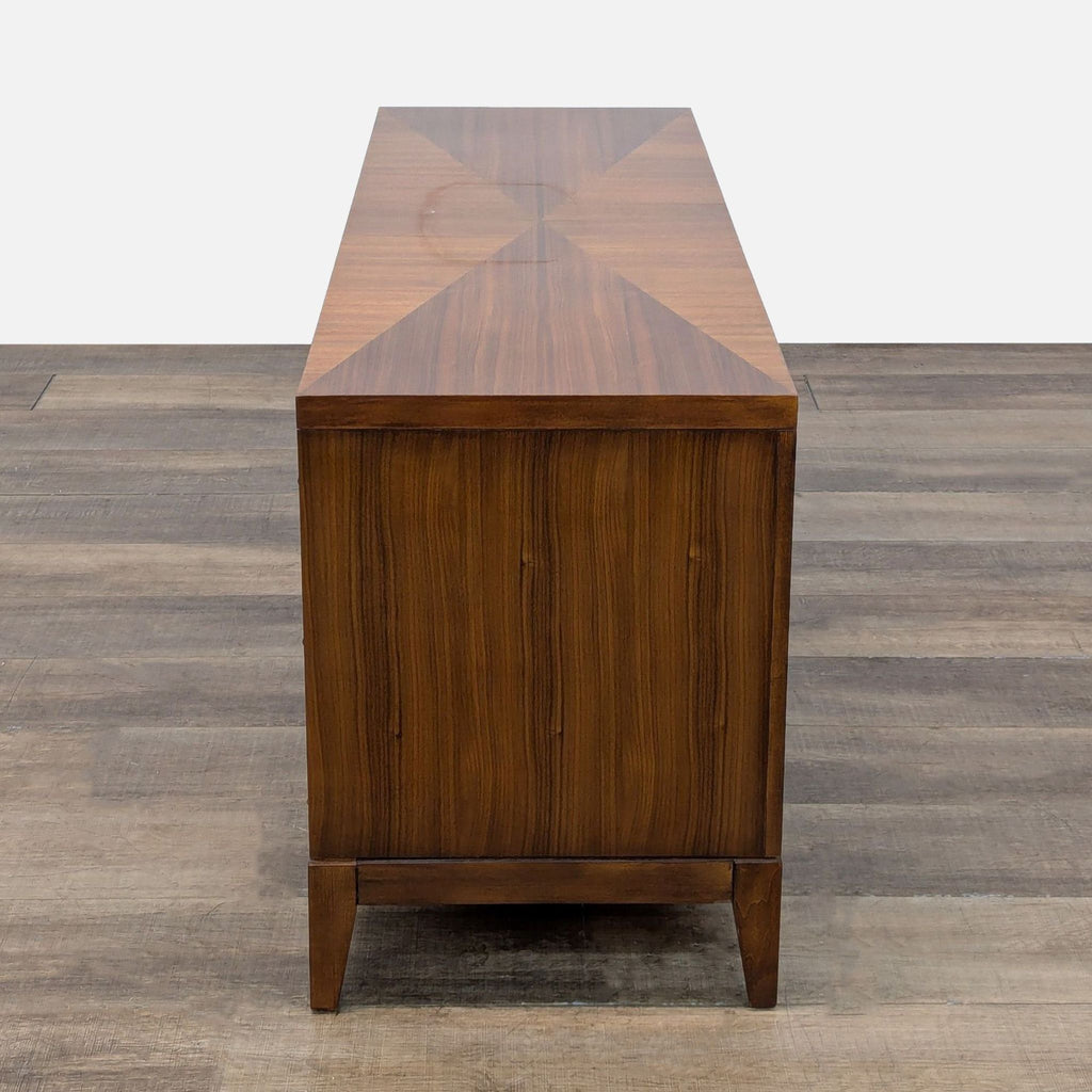 3. Rear view of the Reperch entertainment center highlighting the wood finish and rectangular shape.