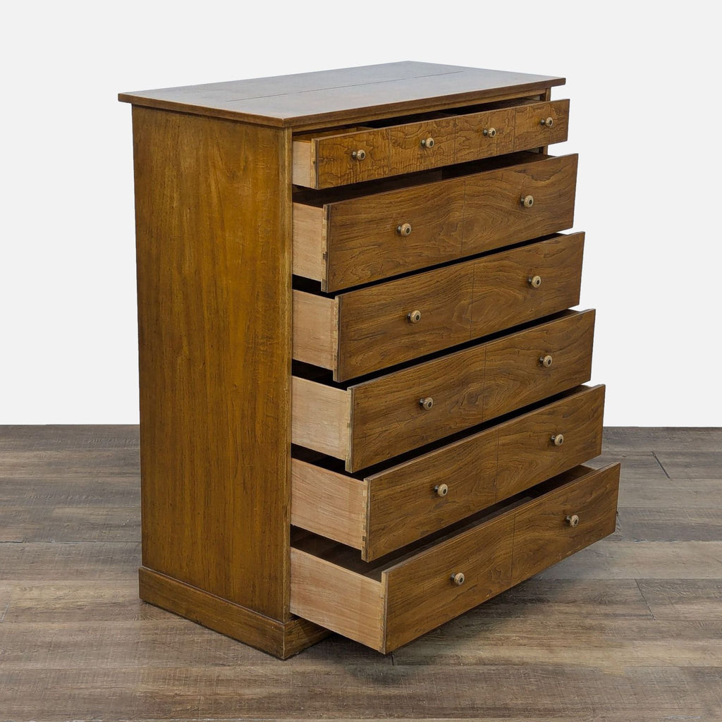 2. Drexel wooden dresser featuring six open dovetail drawers with knob hardware, angled side view.