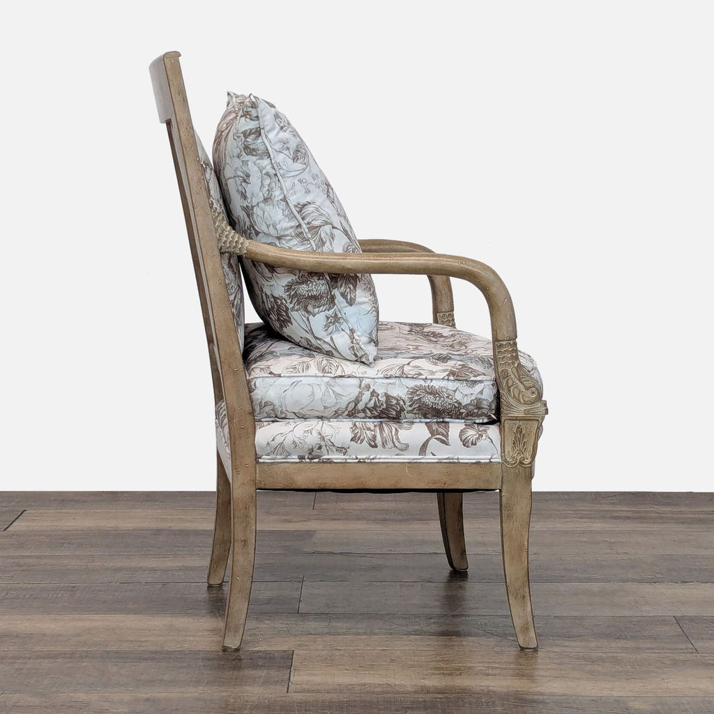 2. Side profile of Reperch lounge chair, showing ornate carved wood frame and plush floral cushions.