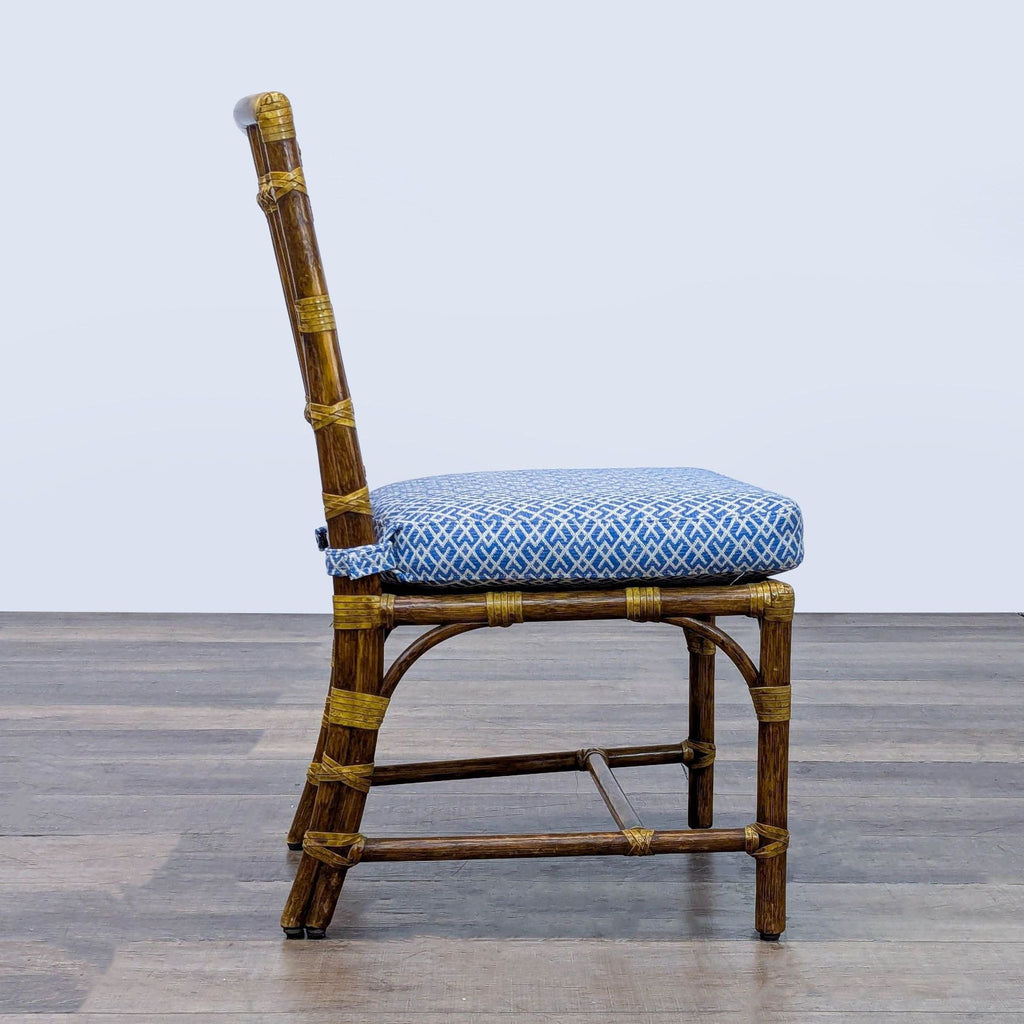 3. Profile view of a McGuire dining chair with a blue patterned seat and intricate woven bindings.