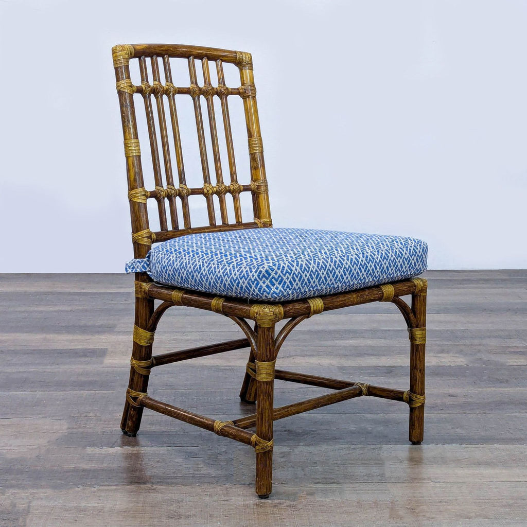 2. Angled side view of a McGuire dining chair featuring bamboo finish and detailed rawhide bindings.