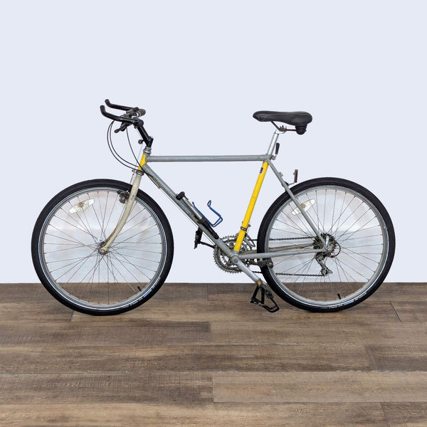 Sturdy Reperch road bike with a durable frame and water bottle holder, ideal for city and light trail rides.