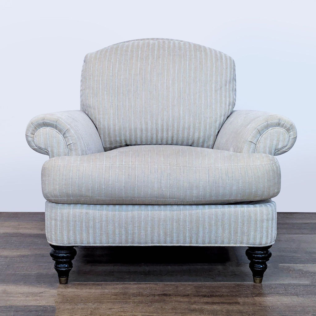 1. Reperch lounge chair with striped upholstery, rolled arms, and turned wood legs with brass caps, front view.