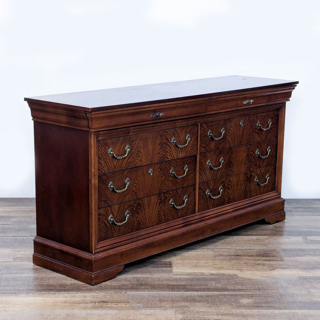 3. Angled view of a rich mahogany Drexel Studio dresser, featuring elegant brass pulls and traditional style.
