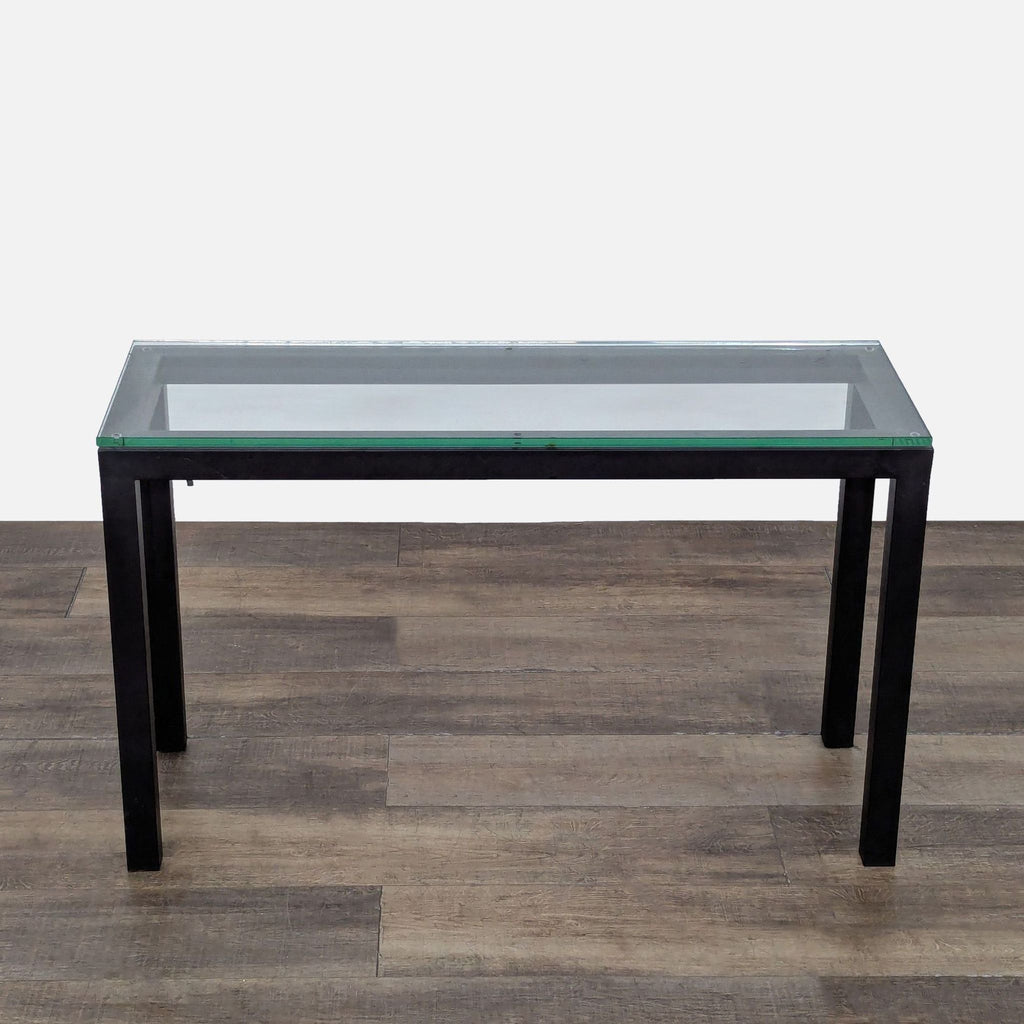 3. Modern Crate and Barrel console table, glass surface on a sturdy, powder-coated black steel frame.