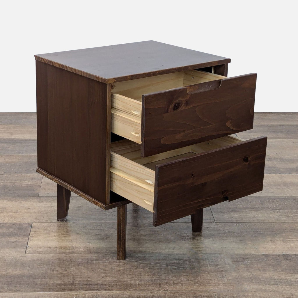 2. Angled view of a West Elm Mid-Century Modern end table with both drawers open, highlighting storage.