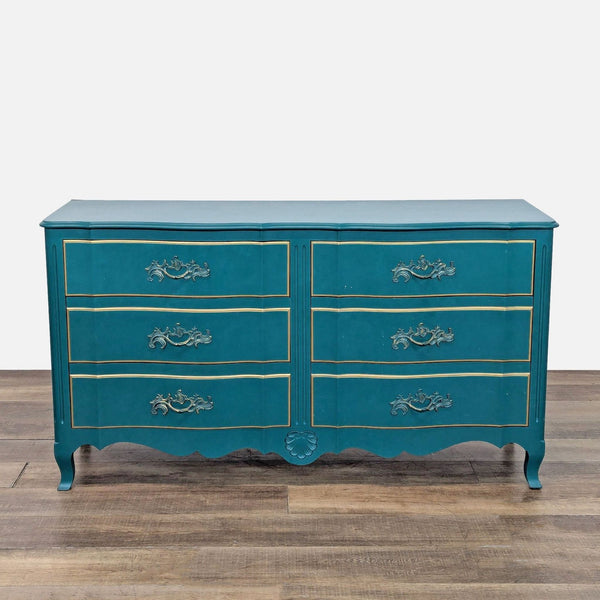 Vintage John Widdicomb Co. dresser with teal finish, gold gilt trim, and ornate handles, shown from the front.