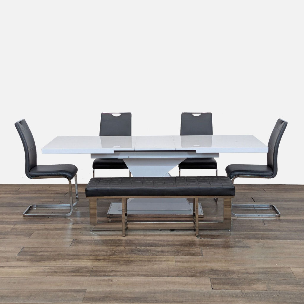 Modern Reperch dining set with expandable table, four black upholstered chairs, and matching metal bench.  