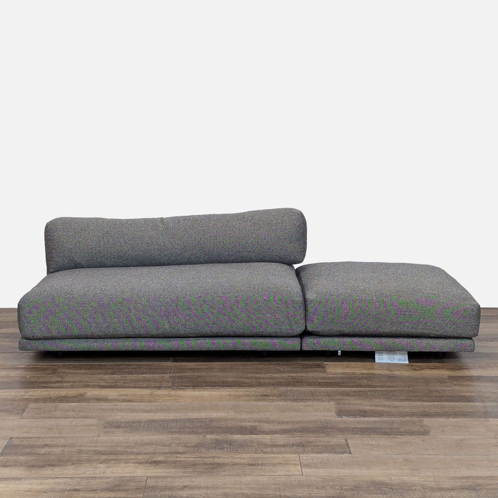 1. Blu Dot low-profile sofa with plush down-wrapped foam cushions, shown from the front on wood floor.