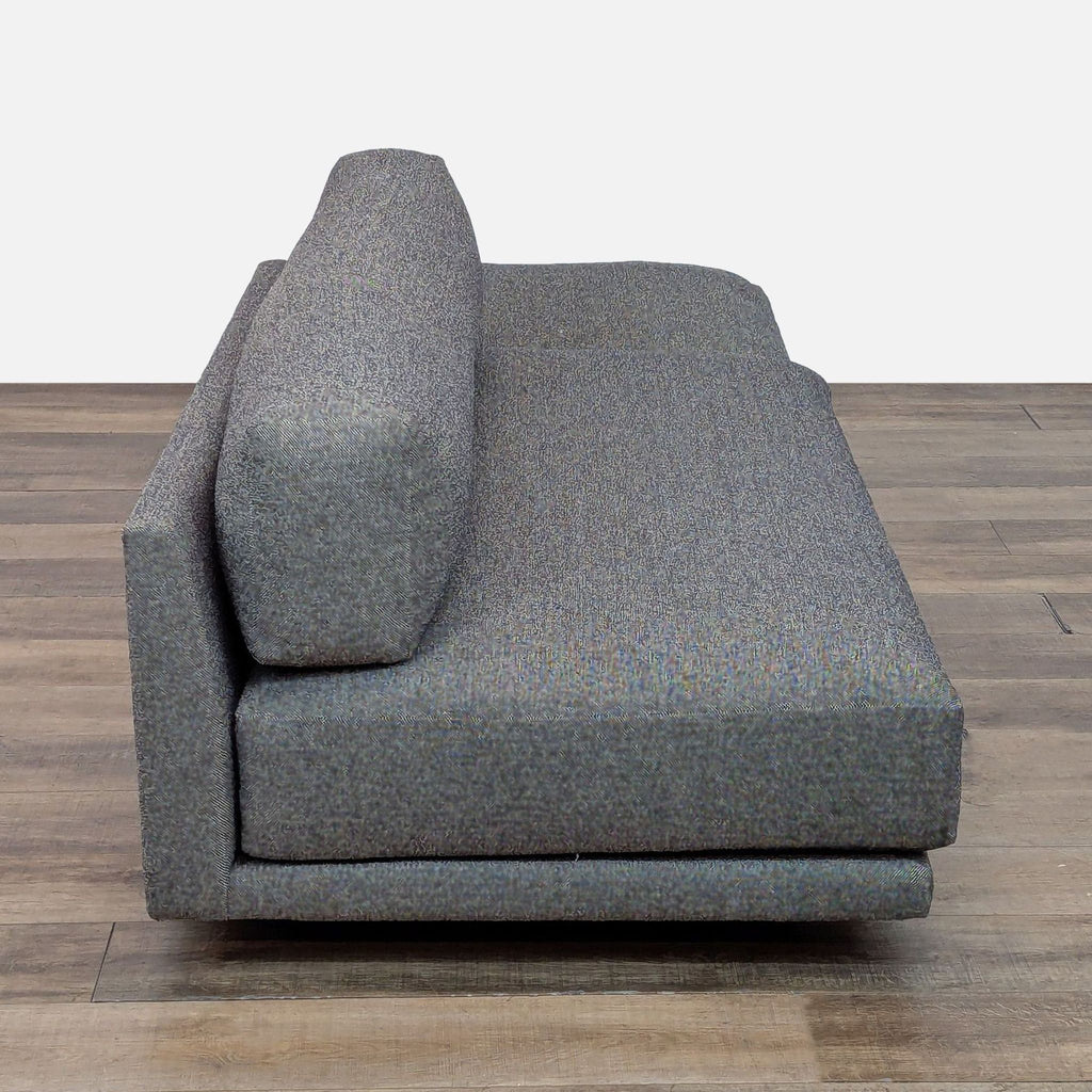 3. Side view of Blu Dot sofa, showcasing the plush backrest, down-wrapped foam, and minimalist frame.