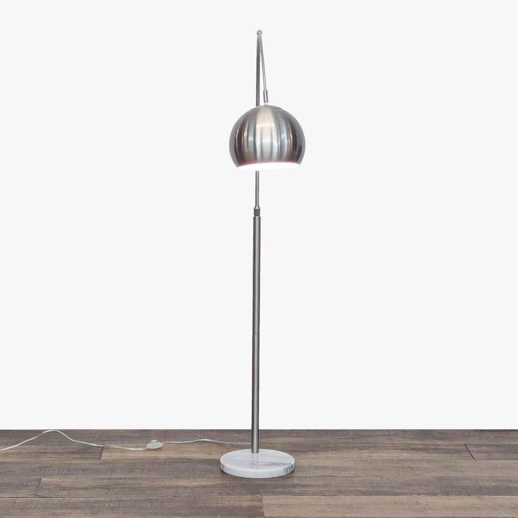 1. Modern arc floor lamp by Reperch with brushed silver finish, slender arm, and white marble base, shown upright.  